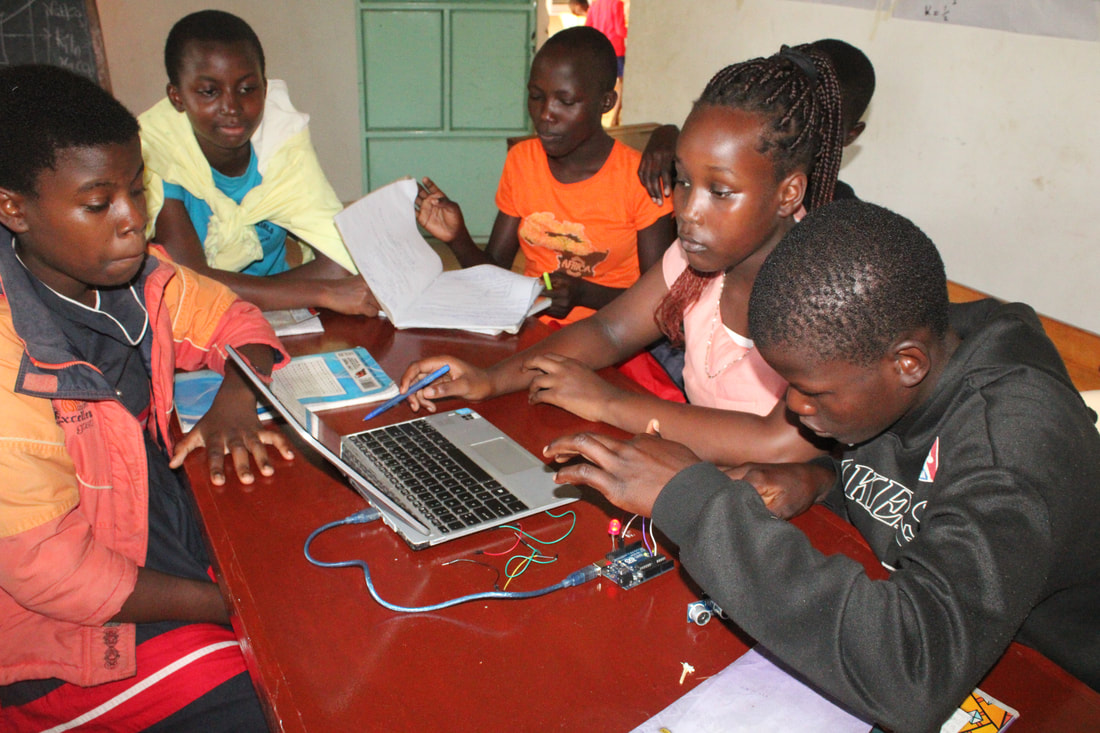 Students working with Arduino