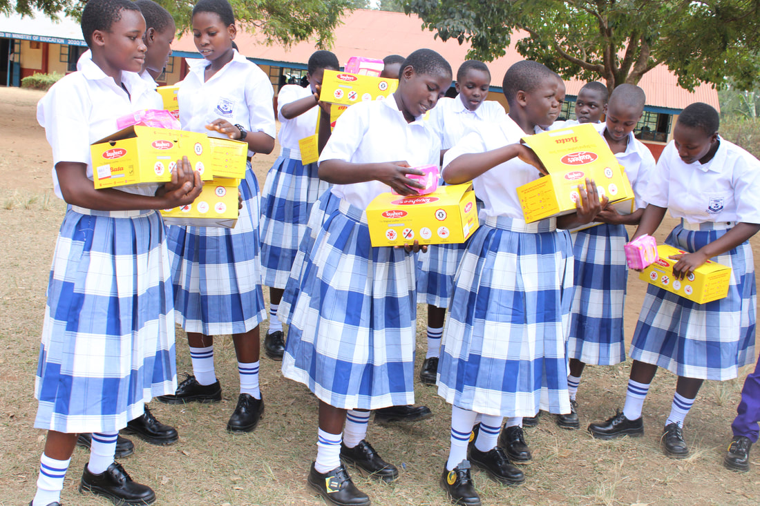 Students receiving new school shoes