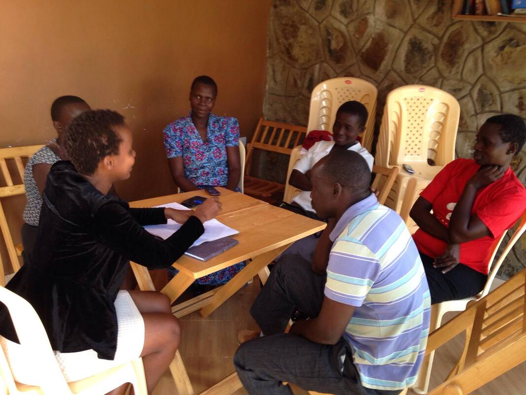 Women taking part in a table banking training session